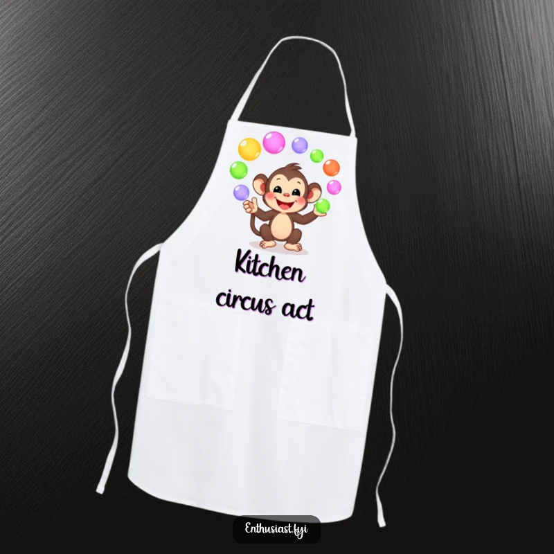 Funny apron with a smiling monkey character juggling colorful, glowing orbs, ideal for playful cooking, baking, or crafting.