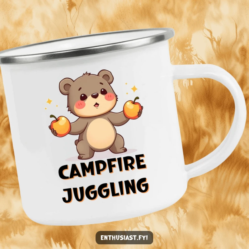 Funny bear cub camping mug, showing an enthusiastic cub juggling apples. Durable and humorous outdoor gift.