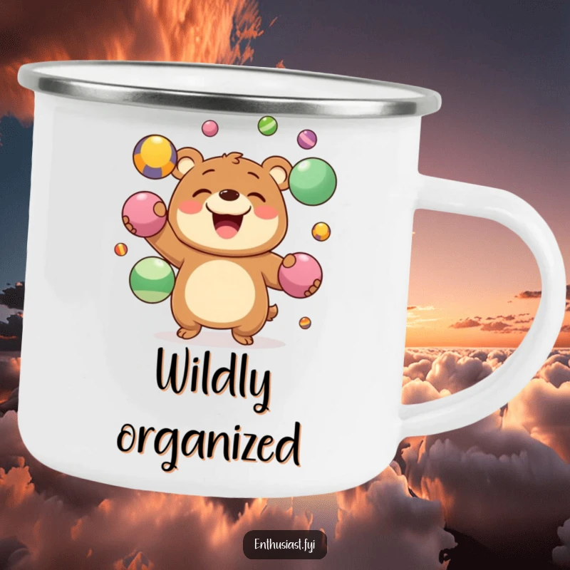 Funny Camping Mug showing a joyous bear character grinning while juggling colorful balls, a humorous outdoor companion.
