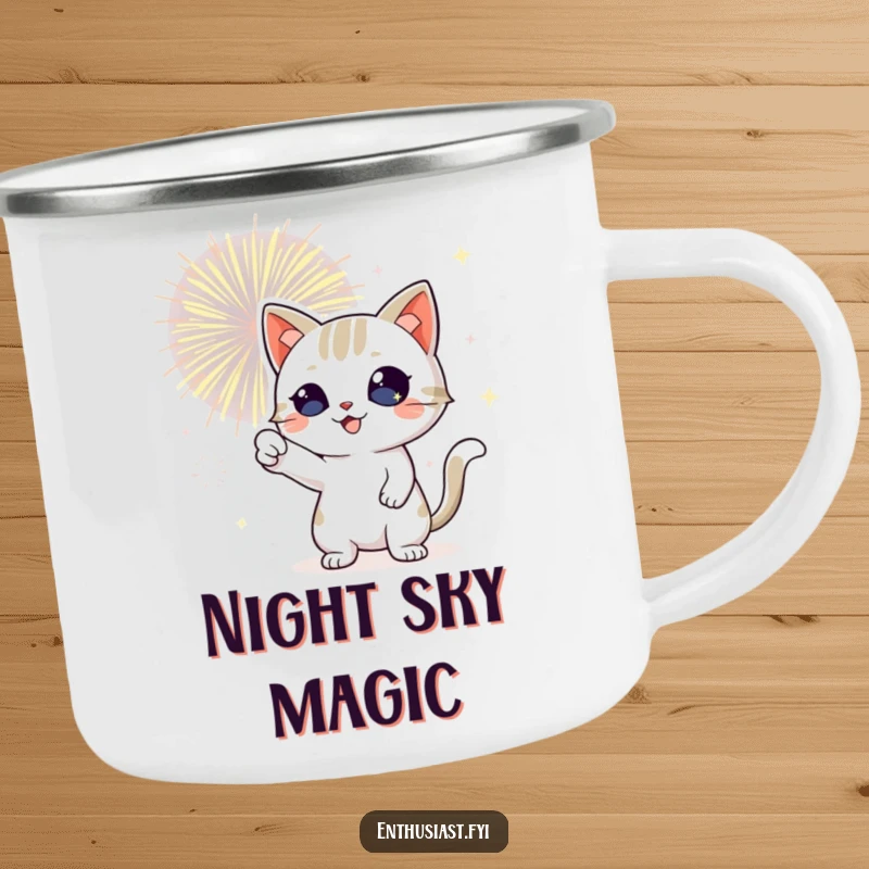Funny cat camping mug featuring a playful cat with sparkling eyes, pointing at fireworks, perfect for outdoor celebrations.