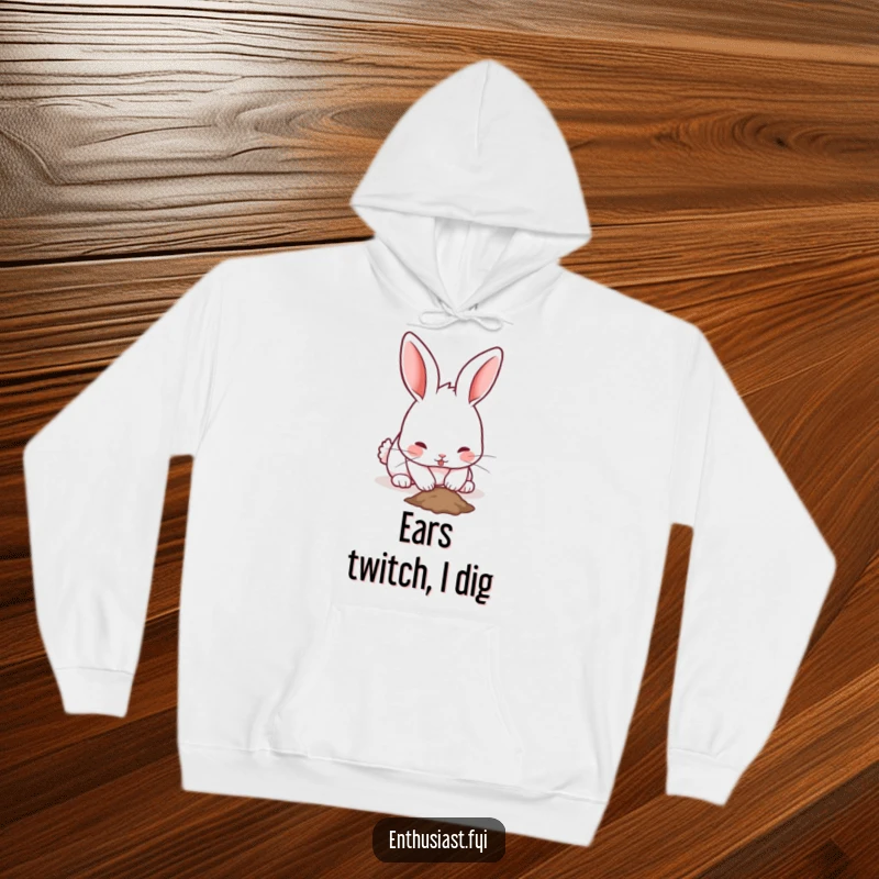 Funny rabbit hoodie featuring a playful bunny with twitching ears, enthusiastically digging a small hole, ideal for rabbit enthusiasts.