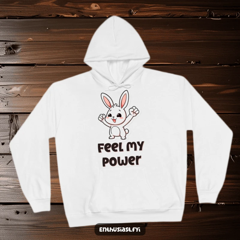 Funny hoodie with a spirited rabbit character vigorously pumping its fist, exuding motivation and a joyful victory pose.