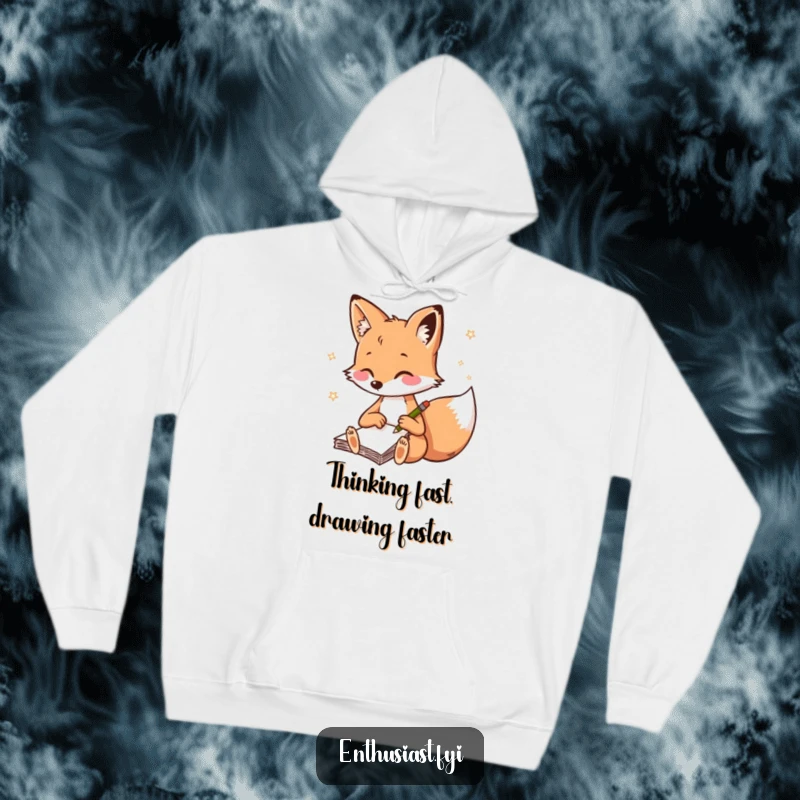 Funny fox hoodie, a playful fox quickly sketching in a notebook, ideal for artists and fox admirers.