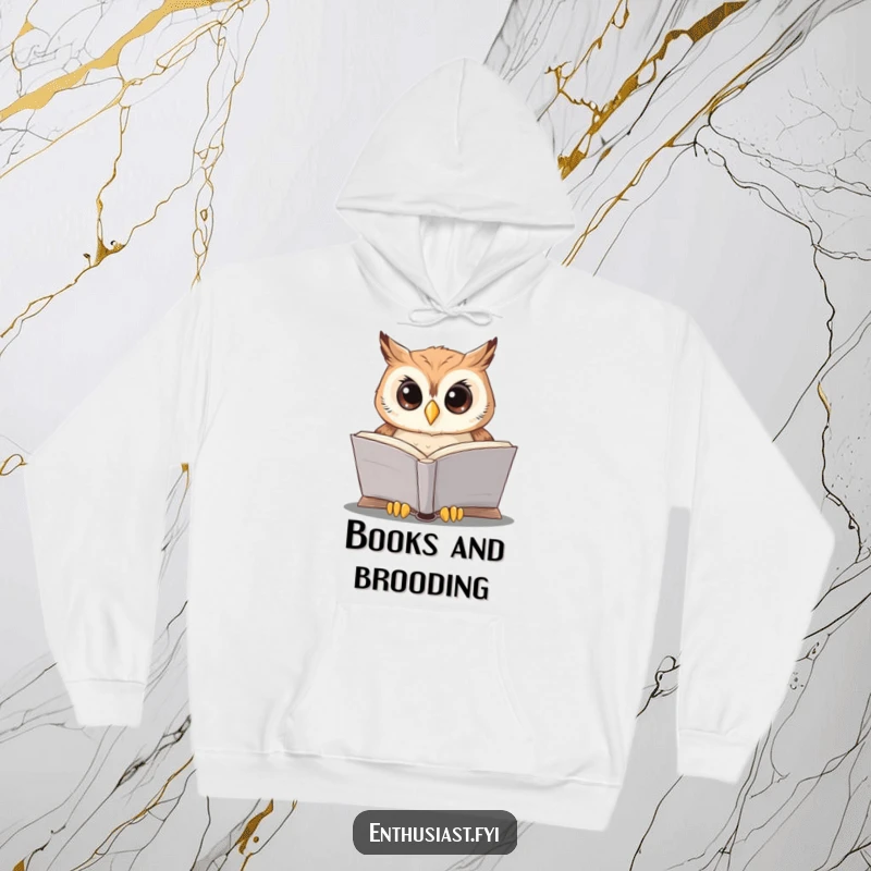 Funny wise owl hoodie features a studious owl reading a large book, offering warmth and intellectual charm for cozy days.