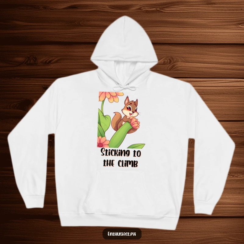 Funny hoodie featuring a determined squirrel climbing a vibrant, giant flower stem, symbolizing hard work and nature's beauty for explorers.