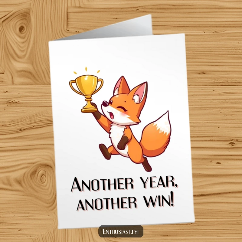 Funny Free Printable Fox Birthday Card: An energetic fox mid-leap, reaching joyfully for a gleaming golden trophy on their special day.