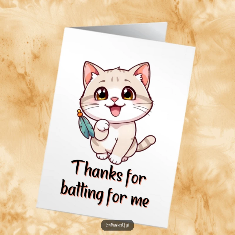 Funny Free Printable Thank You Card: Cheerful cat batting at a feather toy, showing thanks.
