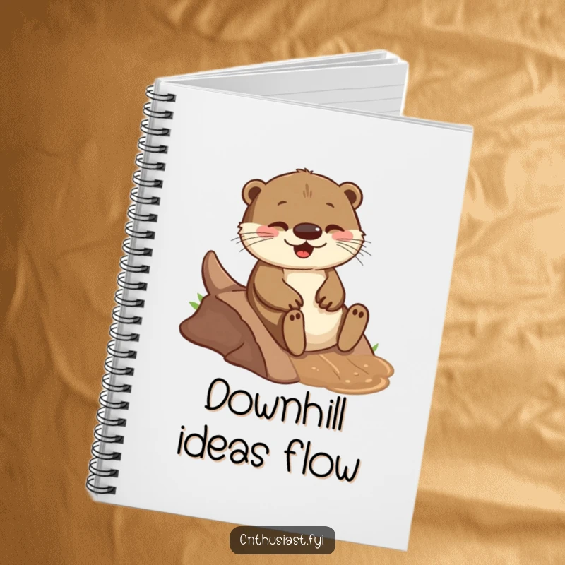 Funny notebook with a playful otter joyfully sliding down a small, muddy incline, ideal for note-taking and journaling.