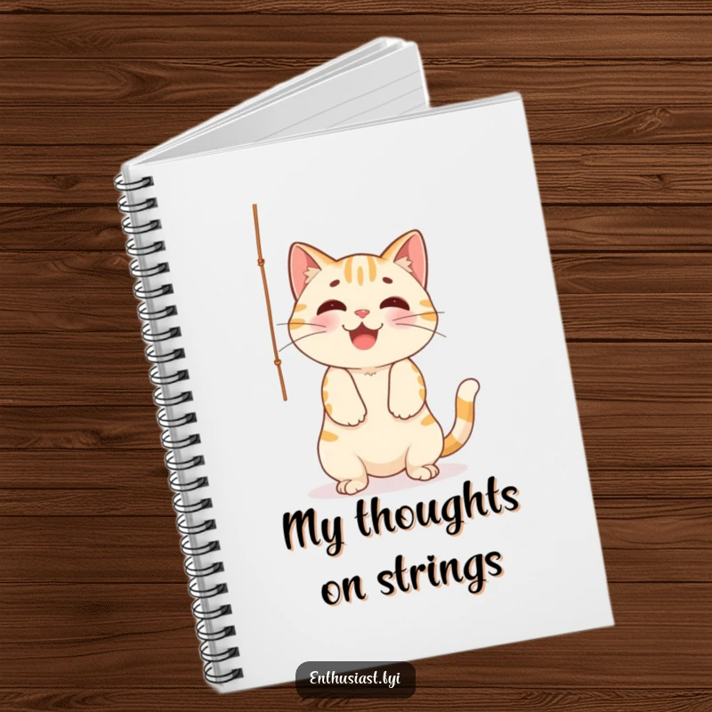 Funny Notebook: Cheerful cat playfully batting at a dangling string, perfect for jotting down ideas with a touch of feline joy.
