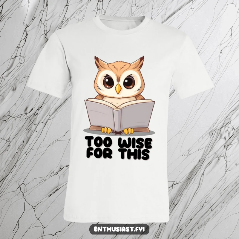 Funny owl reader t-shirt depicts a focused owl deeply immersed in reading a large, open book, exuding studious charm.