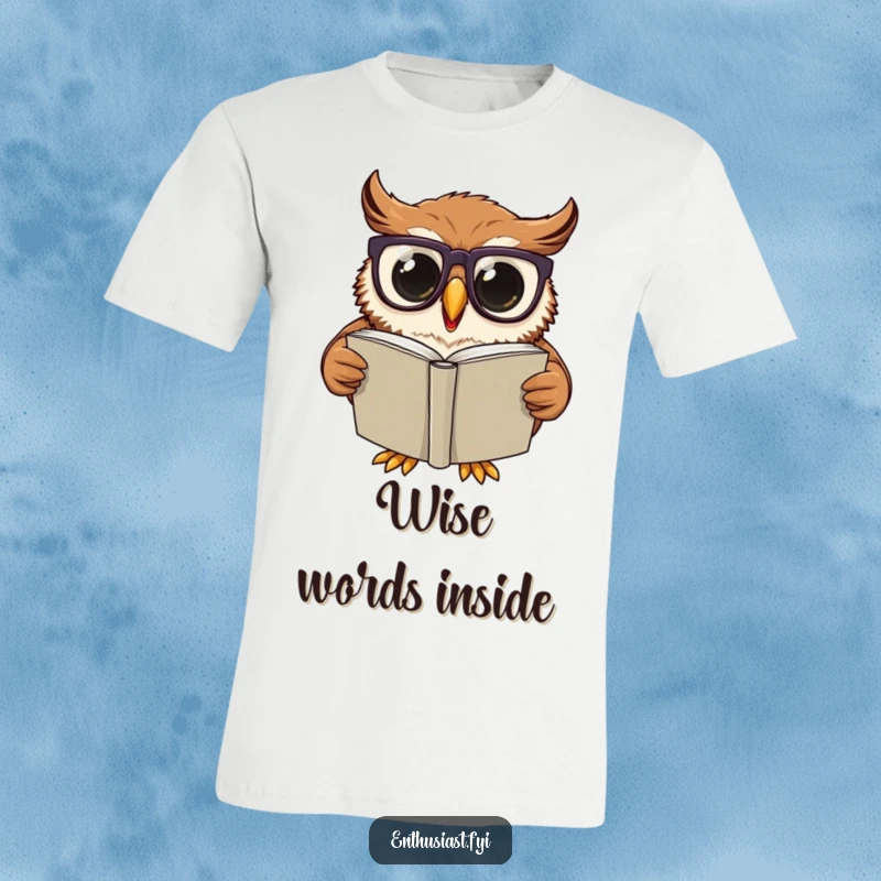 Funny T-Shirt: Excited owl wearing oversized glasses, engrossed in reading a large book, celebrating intelligence and a love for literature.