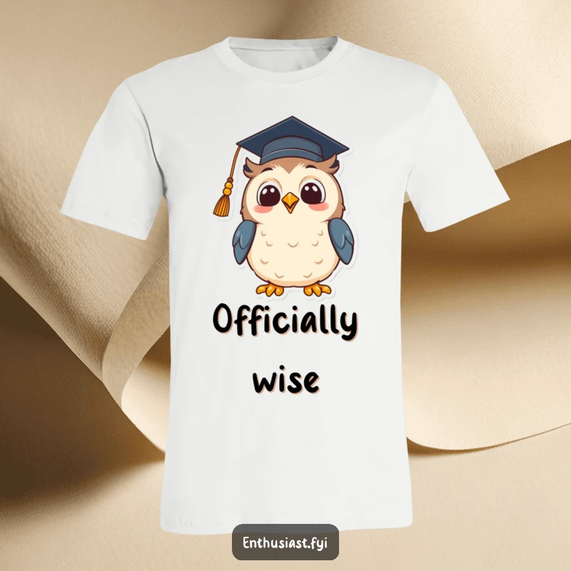 Funny t-shirt featuring a beaming owl character wearing a graduation cap, looking up with hopeful excitement, celebrating wisdom and new beginnings.