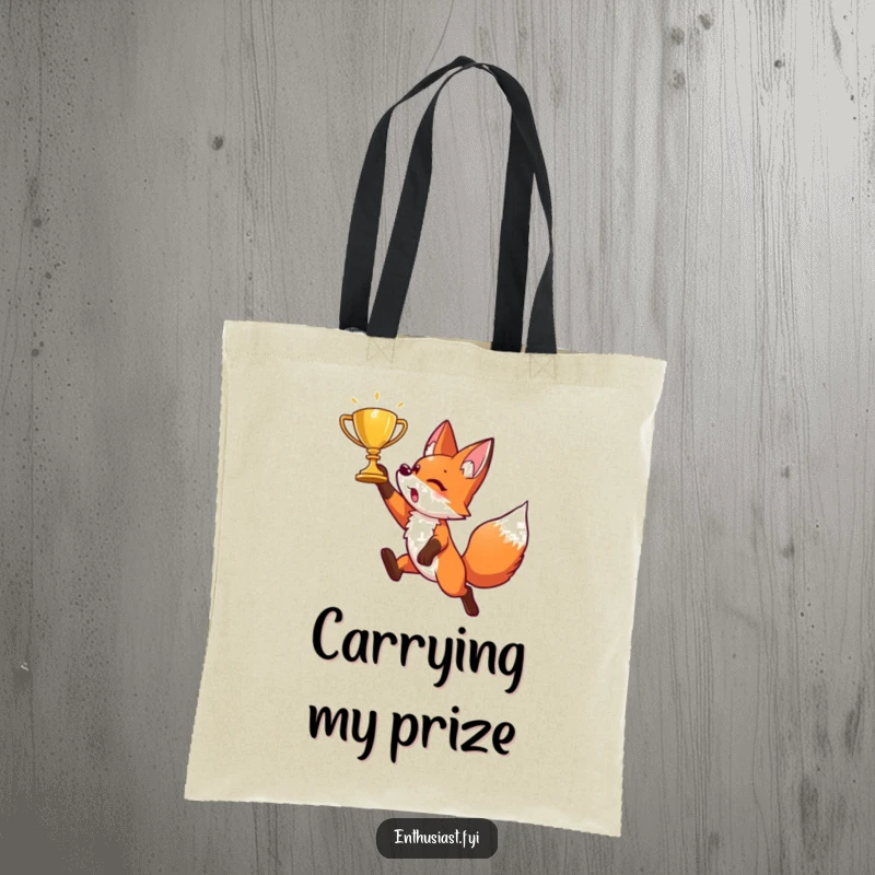 Funny tote bag with an energetic fox character leaping dynamically to grab a glittering golden trophy. Perfect for achievers.