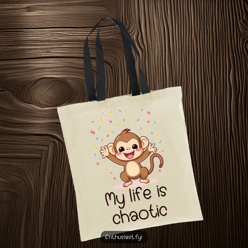 Funny monkey tote bag with a character enthusiastically throwing confetti, perfect for party supplies.